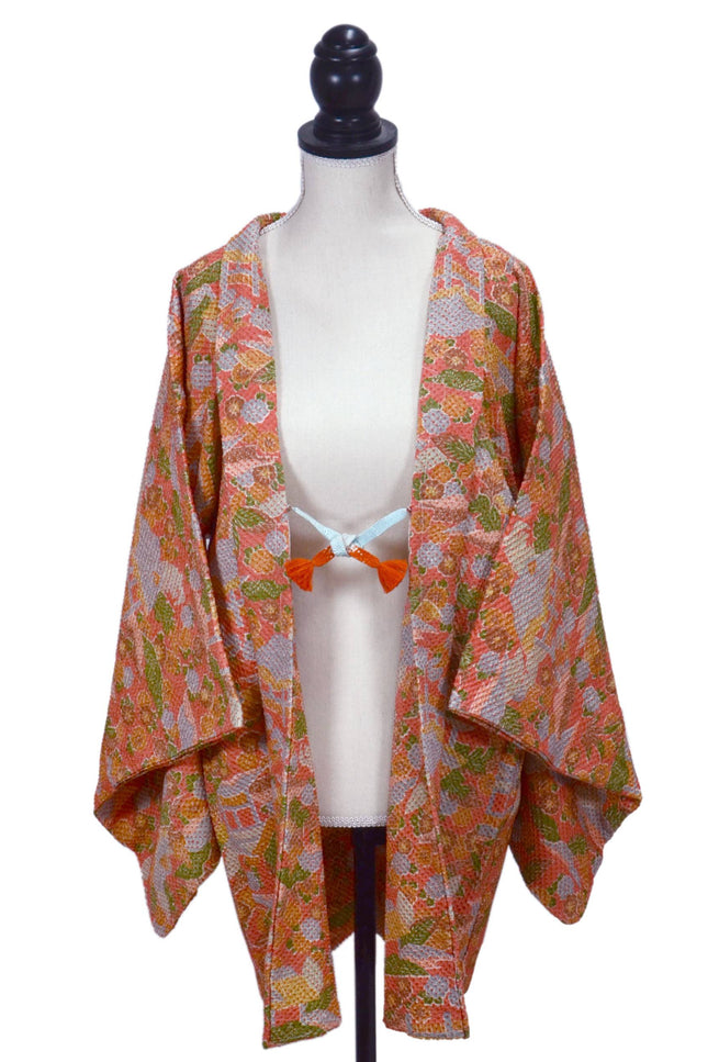 Haori with Shibori pattern - Pink orange with traditional Japanese houses and flowers