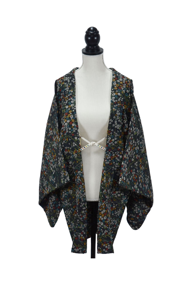 Vintage Haori with multicolored floral patterns.