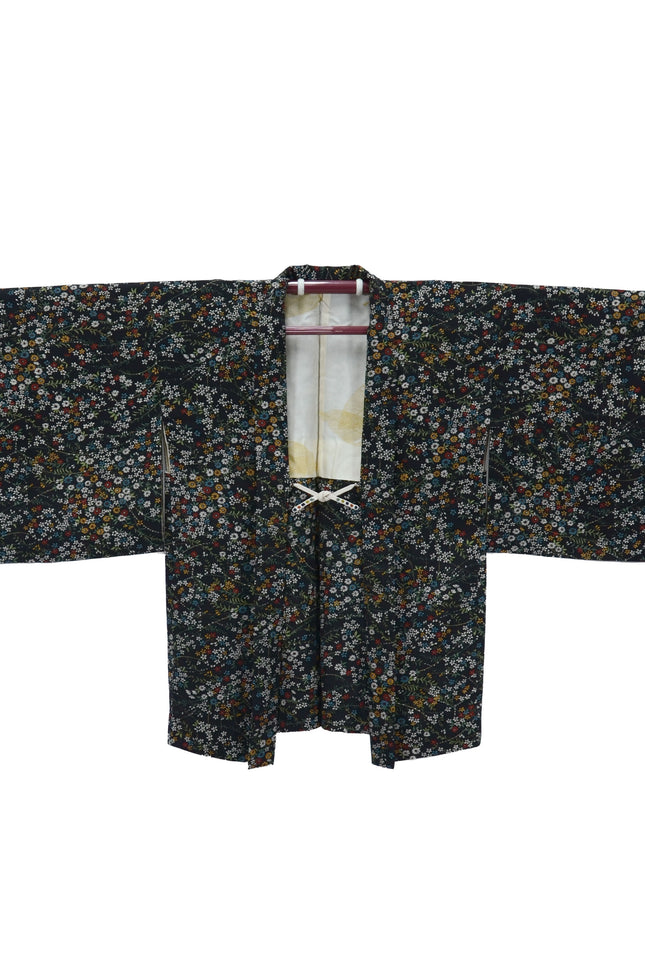 Vintage Haori with multicolored floral patterns.