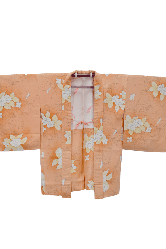 Vintage Haori with a floral flower pattern in soft orange