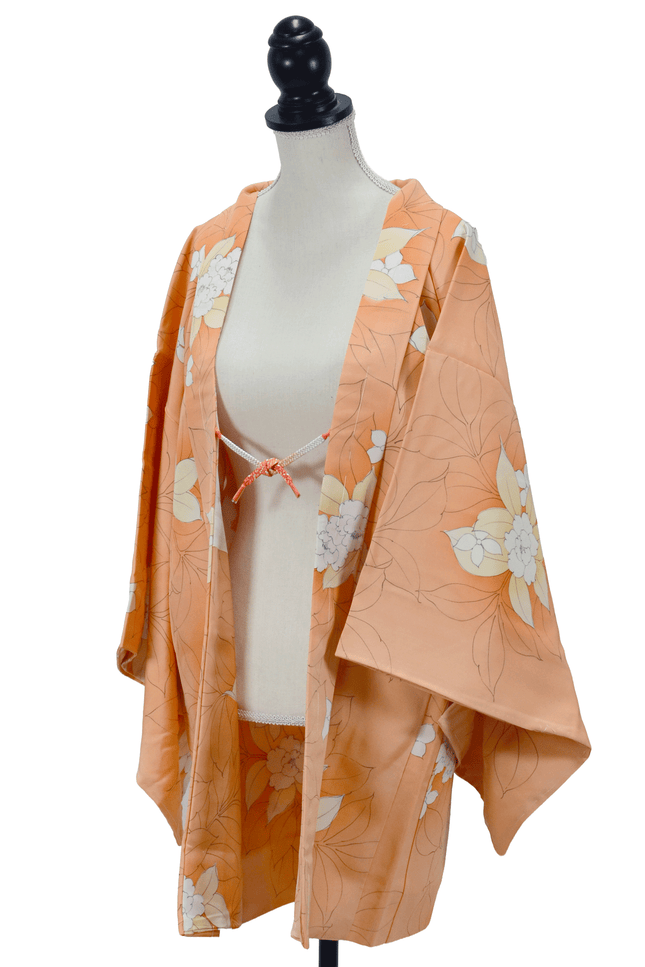 Vintage Haori with a floral flower pattern in soft orange