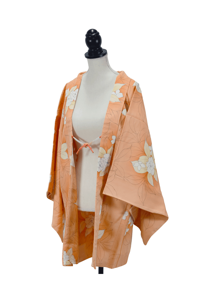 Vintage Haori with a floral flower pattern in soft orange