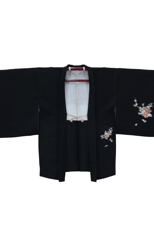 Vintage Haori with floral pattern on a black background