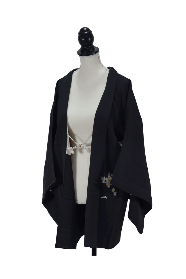 Vintage Haori with floral pattern on a black background