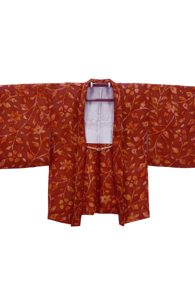 Vintage Haori with abstract floral and leaf pattern in shades of orange