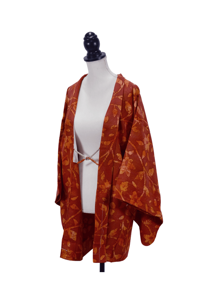 Vintage Haori with abstract floral and leaf pattern in shades of orange