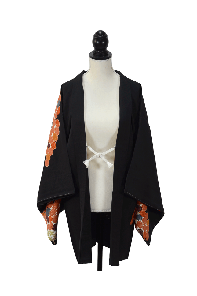 Vintage Haori with chrysanthemum pattern on a black background