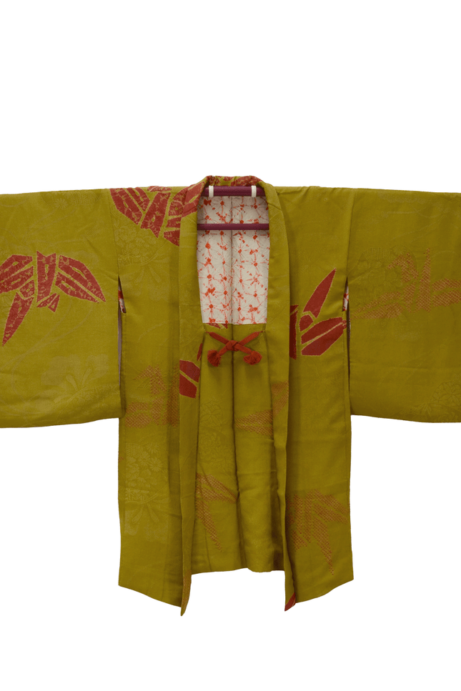 Antique haori with crane motif in yellow-green and shibori lining ( ca 1920 - 1930 )
