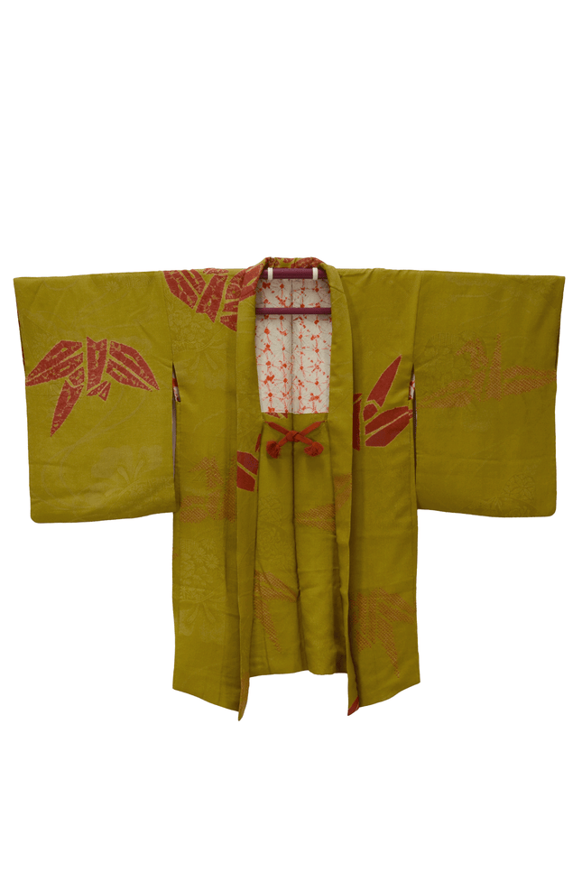 Antique haori with crane motif in yellow-green and shibori lining ( ca 1920 - 1930 )